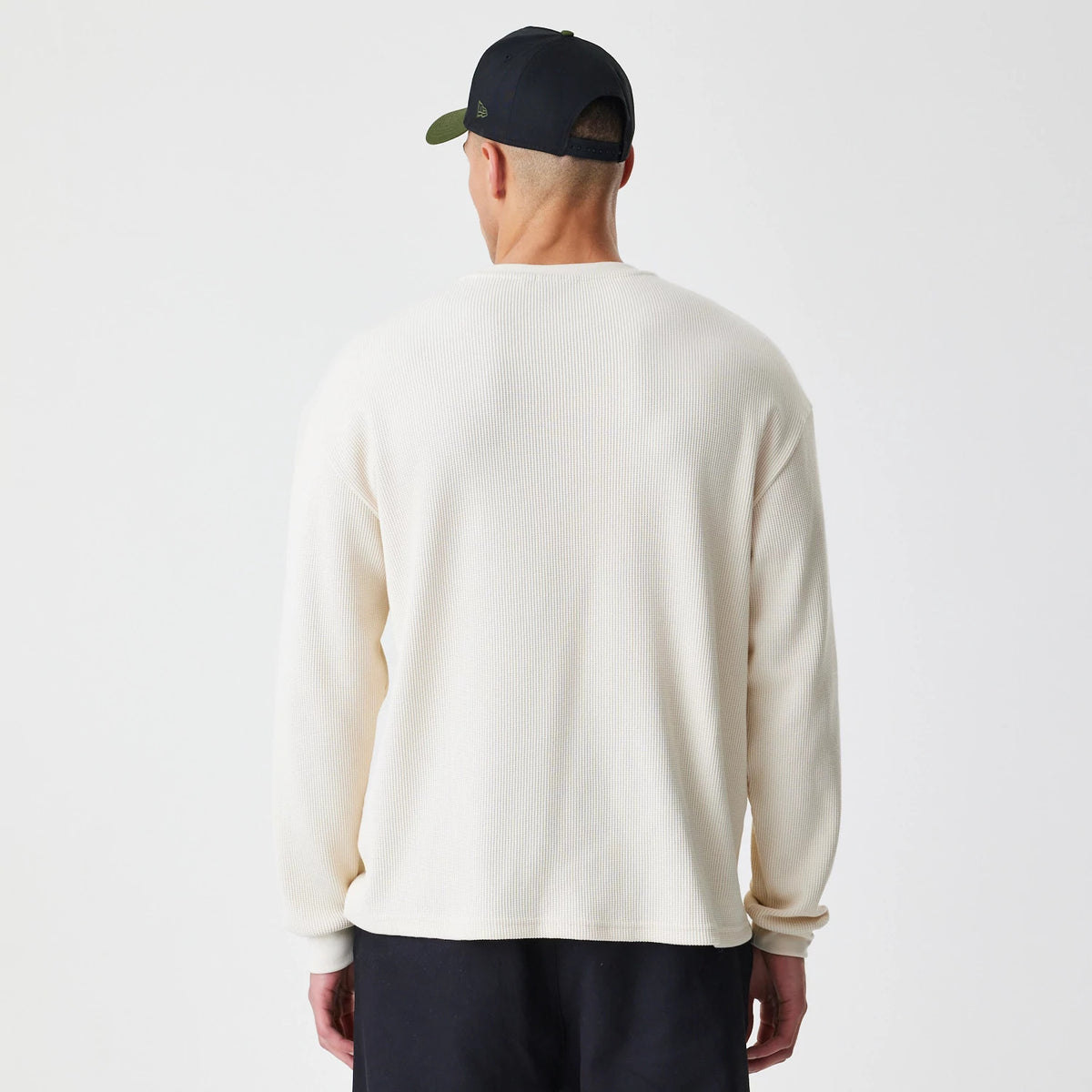 The Male model is wearing  New Era Waffle Light Beige Long Sleeve T-Shirt 2