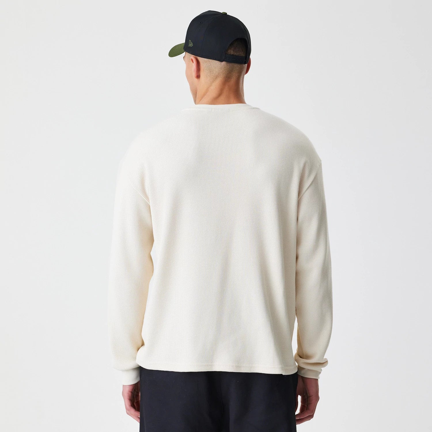 The Male model is wearing  New Era Waffle Light Beige Long Sleeve T-Shirt 2