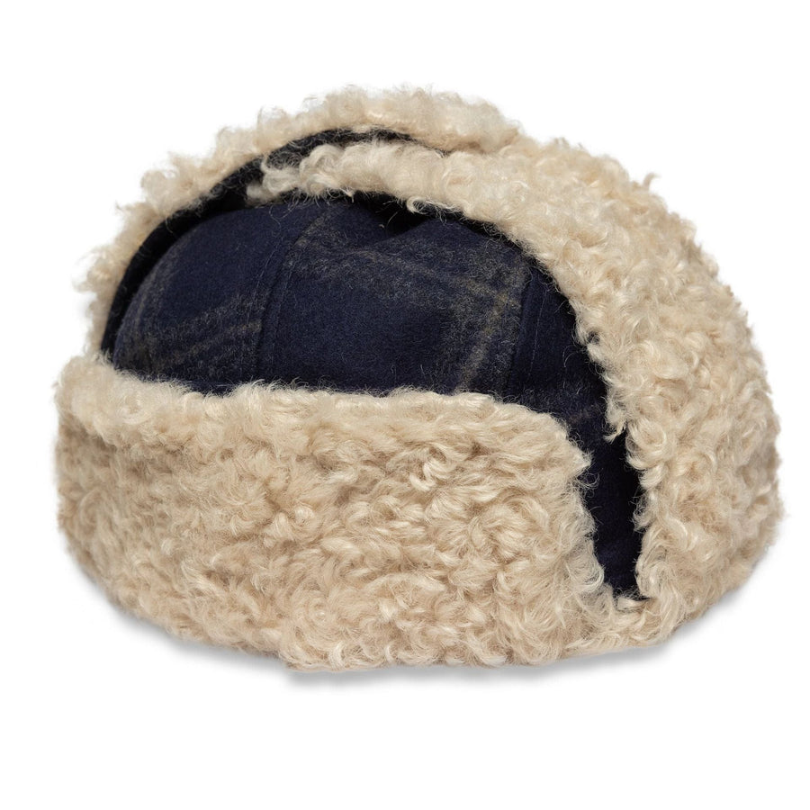 This is a New Era Loden Navy Trapper Hat 1