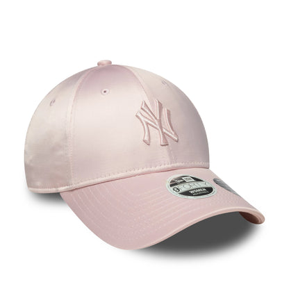 New York Yankees Womens MLB Satin Bow Back Pastel Pink New Era 9FORTY Adjustable Cap, three-quarter view showing the pink raised embroidered NY logo on the front panel with a curved pastel pink visor and 9FORTY size sticker.