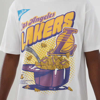 New Era LA Lakers NBA Lifestyle Graphic White T-Shirt, front view displaying a colourful graphic design with large purple and yellow Lakers lettering, a basketball-themed image, and an embroidered New Era logo on the upper chest.