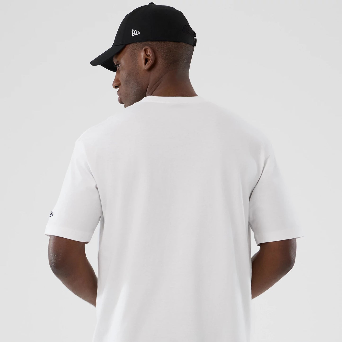 The Male model is wearing New York Yankees MLB Lifestyle Graphic White T-Shirt 6
