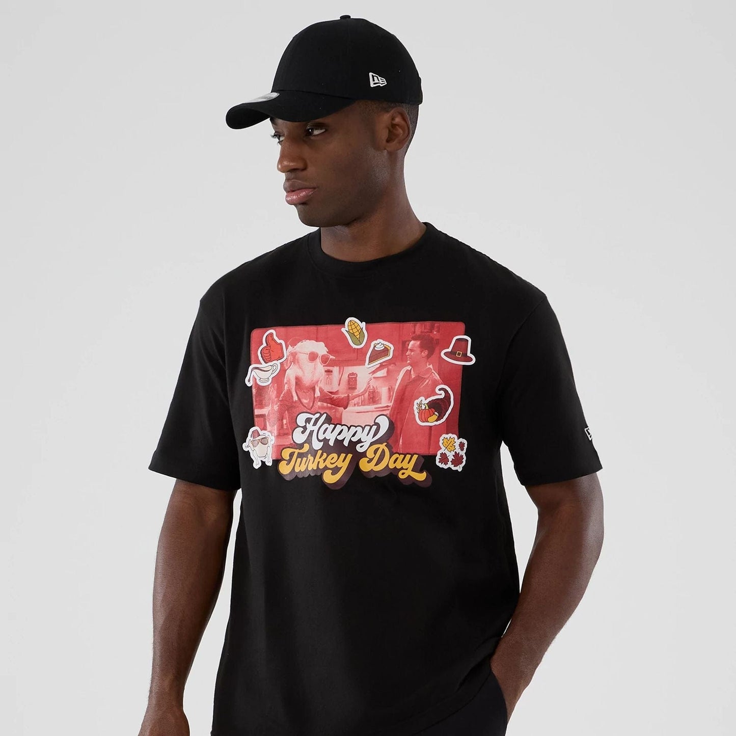The Male model is wearing Friends Turkey Head Lifestyle Graphic Black T-Shirt  7