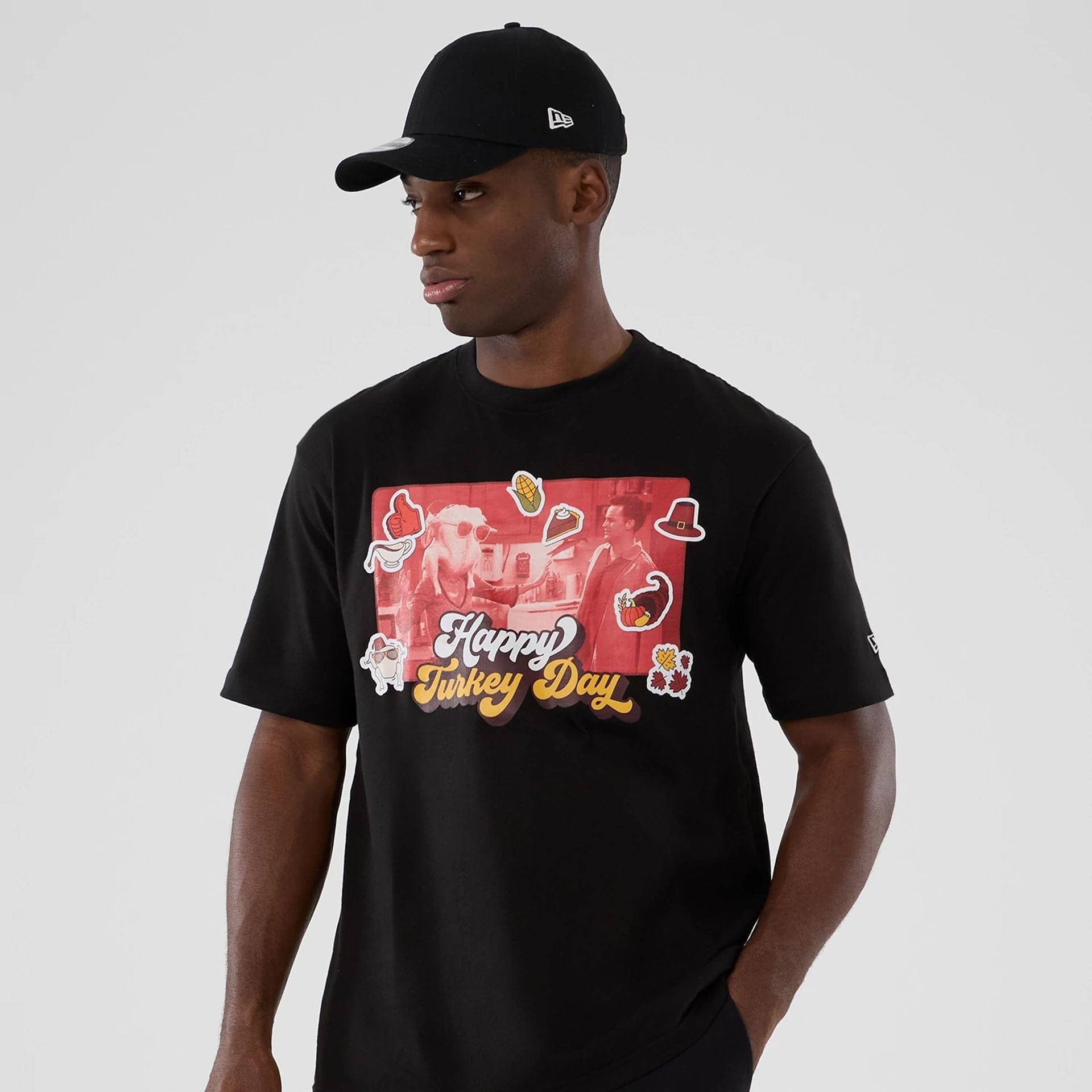 The Male model is wearing Friends Turkey Head Lifestyle Graphic Black T-Shirt  7
