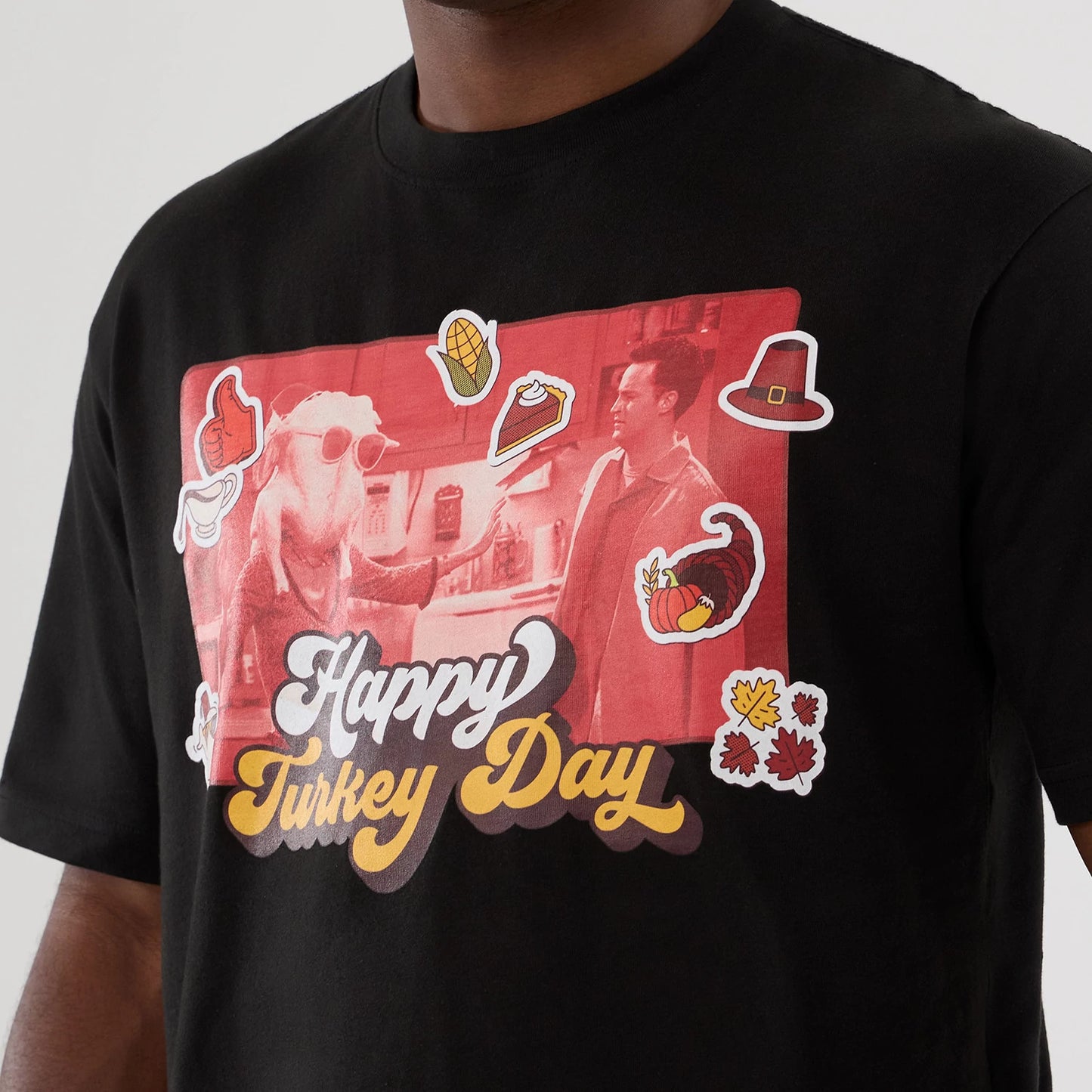 The Male model is wearing Friends Turkey Head Lifestyle Graphic Black T-Shirt 4