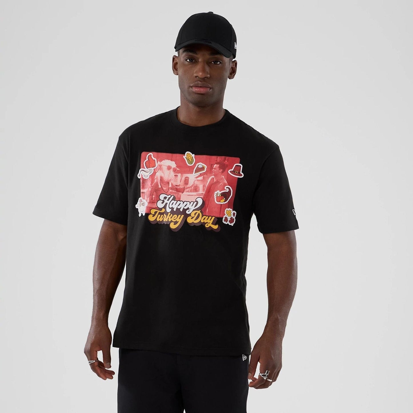 The Male model is wearing Friends Turkey Head Lifestyle Graphic Black T-Shirt  1