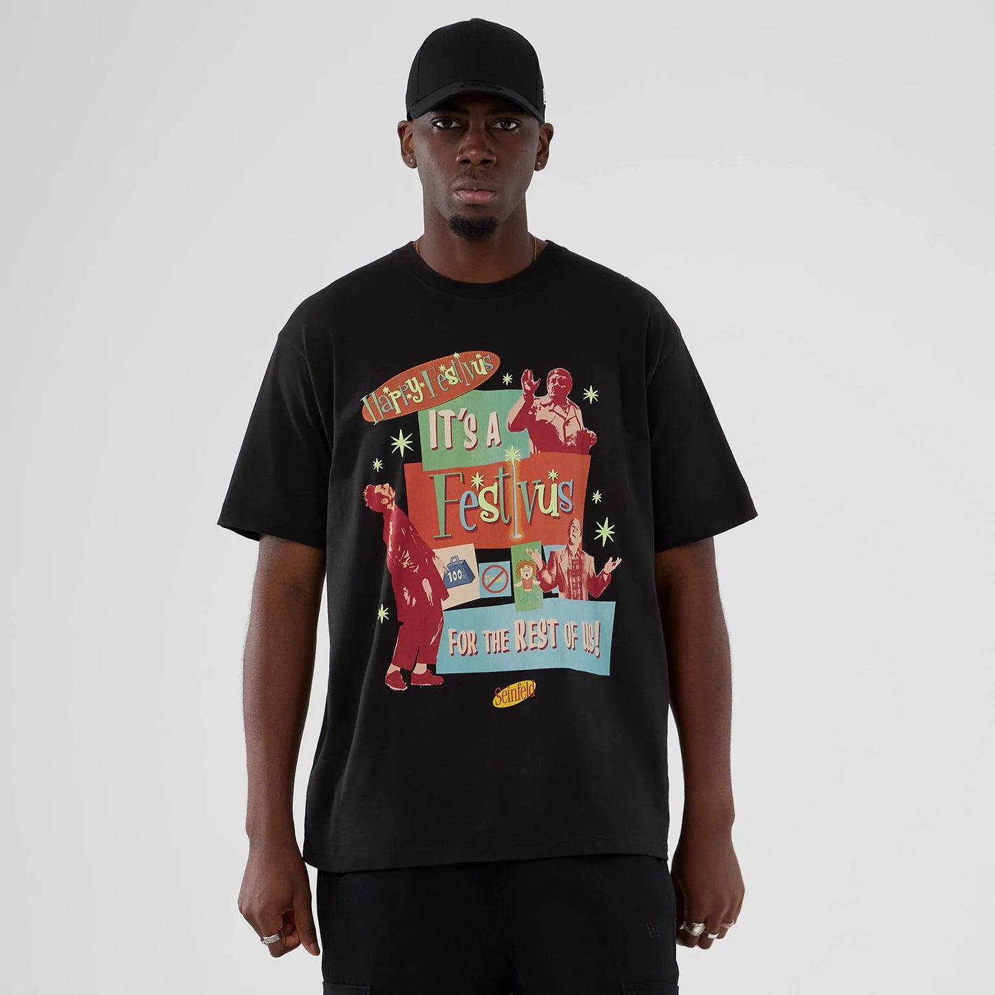 The Male model is wearing Seinfeld Lifestyle Graphic Black T-Shirt 1