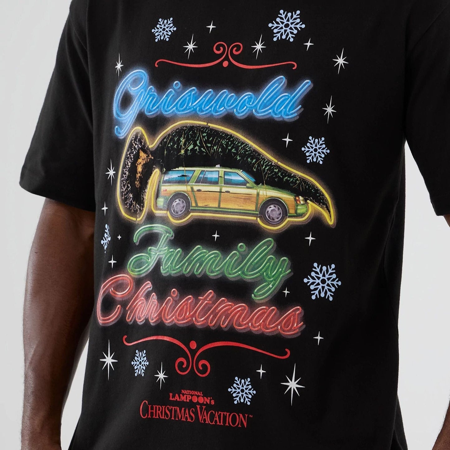 The Male model is wearing National Lampoon's Christmas Vacation Lifestyle Graphic Black T-Shirt  4