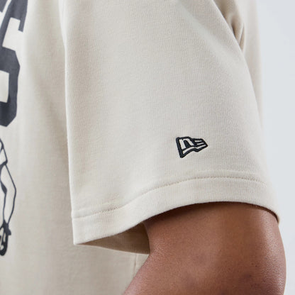 The Male model is wearing New York Giants NFL Throwback Prep Light Beige T-Shirt 6