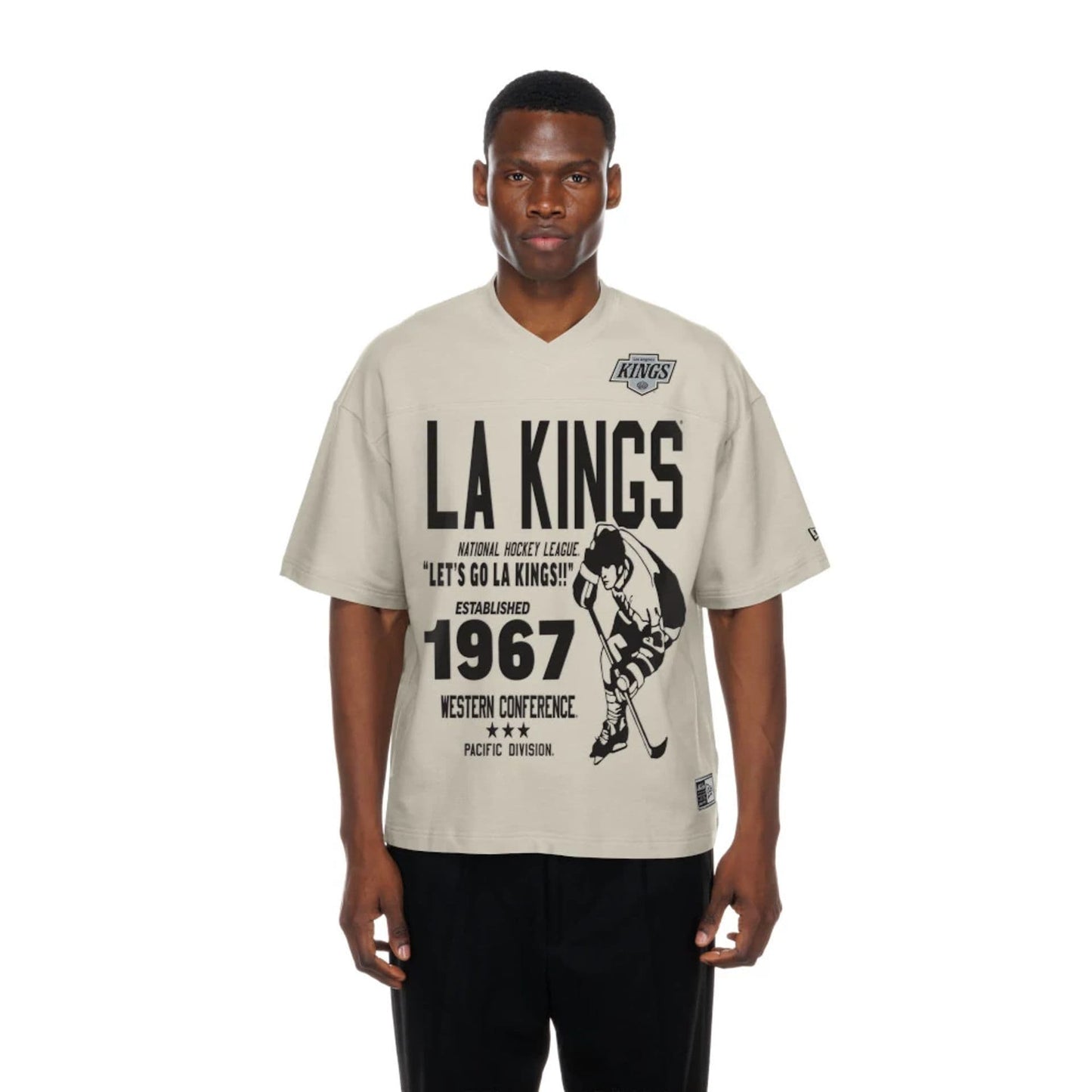 The Male model is wearing LA Kings NHL Throwback Prep Light Beige T-Shirt  1
