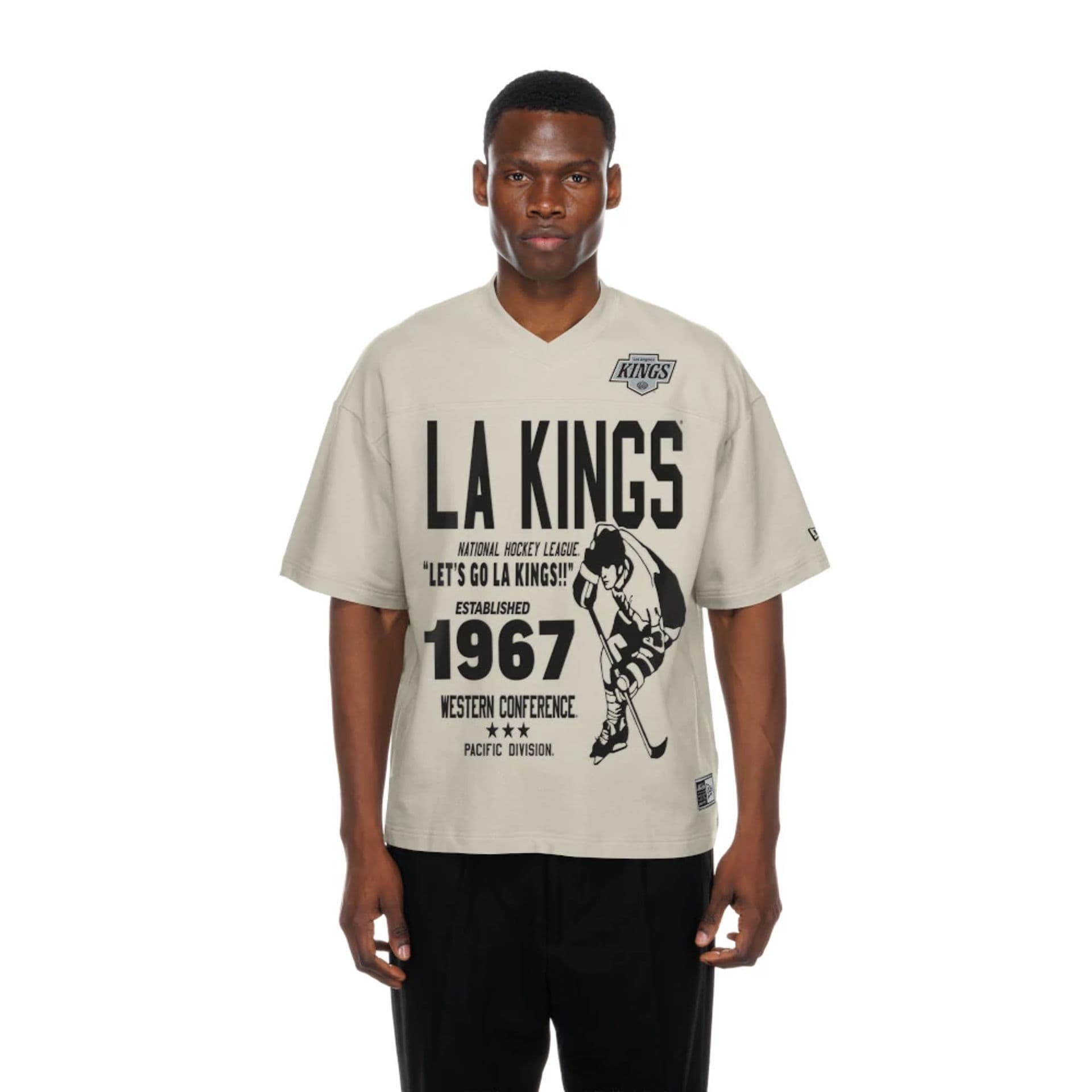 The Male model is wearing LA Kings NHL Throwback Prep Light Beige T-Shirt  1
