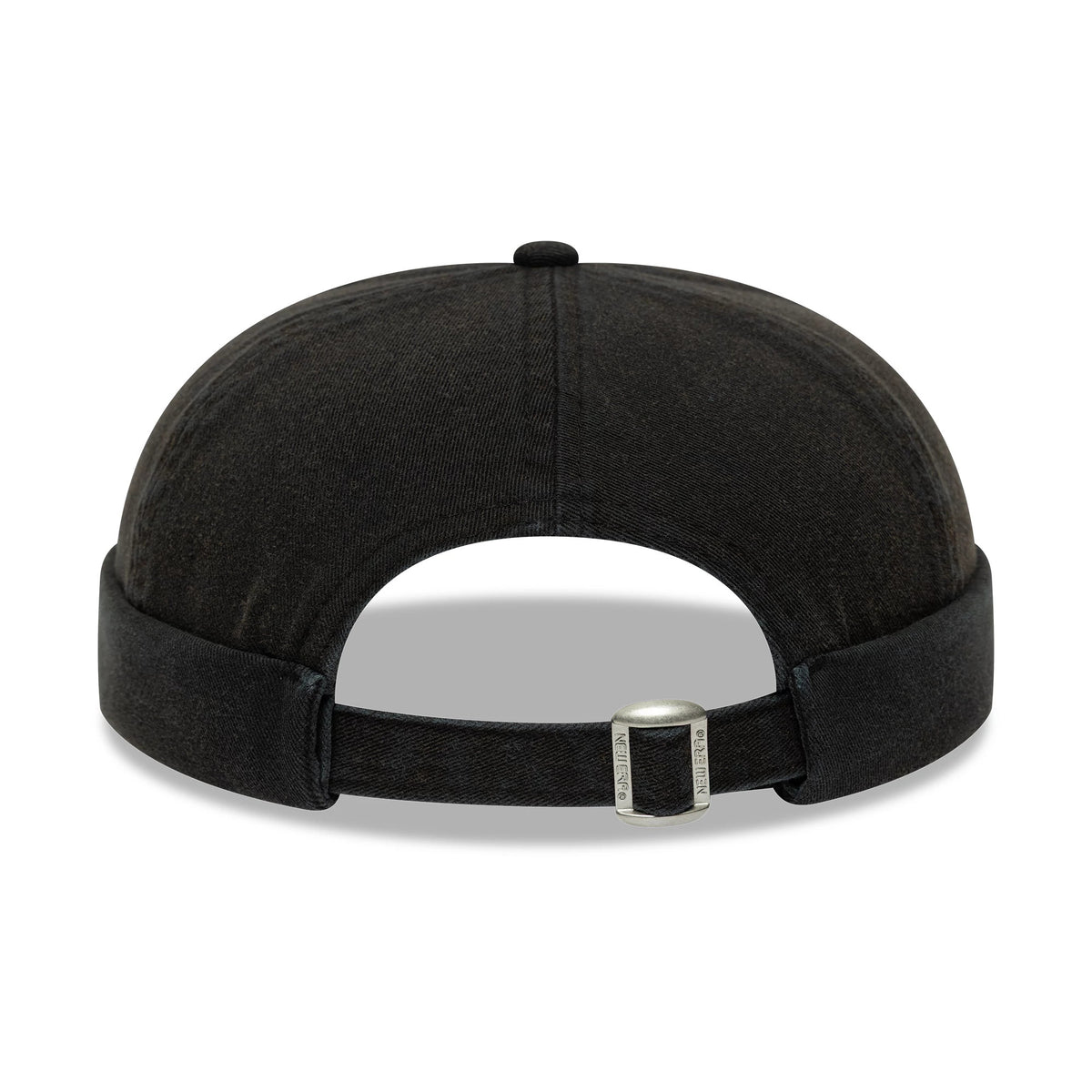 New Era Washed Cotton Black Docker Adjustable Hat, rear view showing the adjustable strap with a buckle featuring the New Era logo, and a rounded crown with stitch in the washed black cotton fabric.