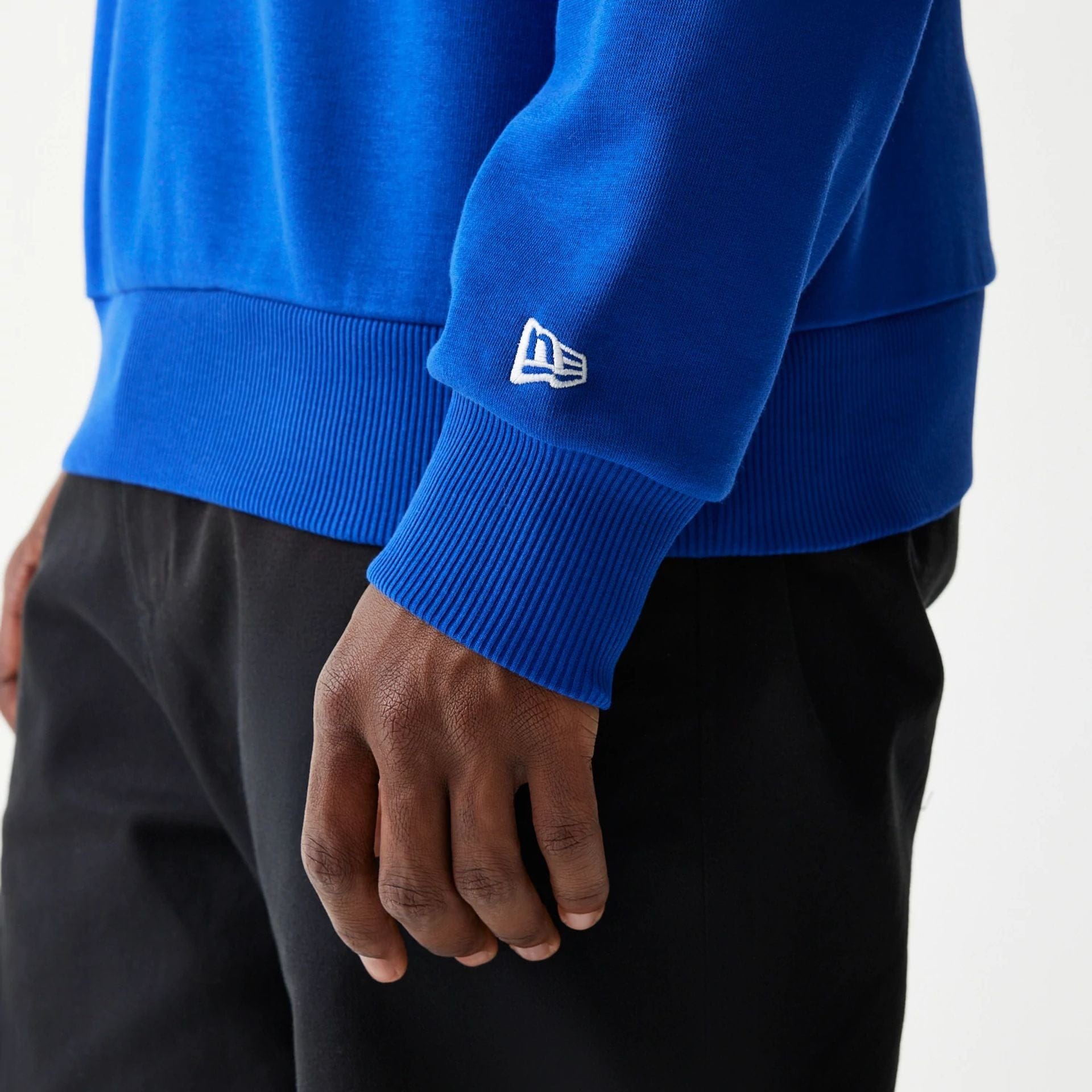 The Male model is wearing Red Bull Racing Blue Oversized Crew Neck Sweater 6