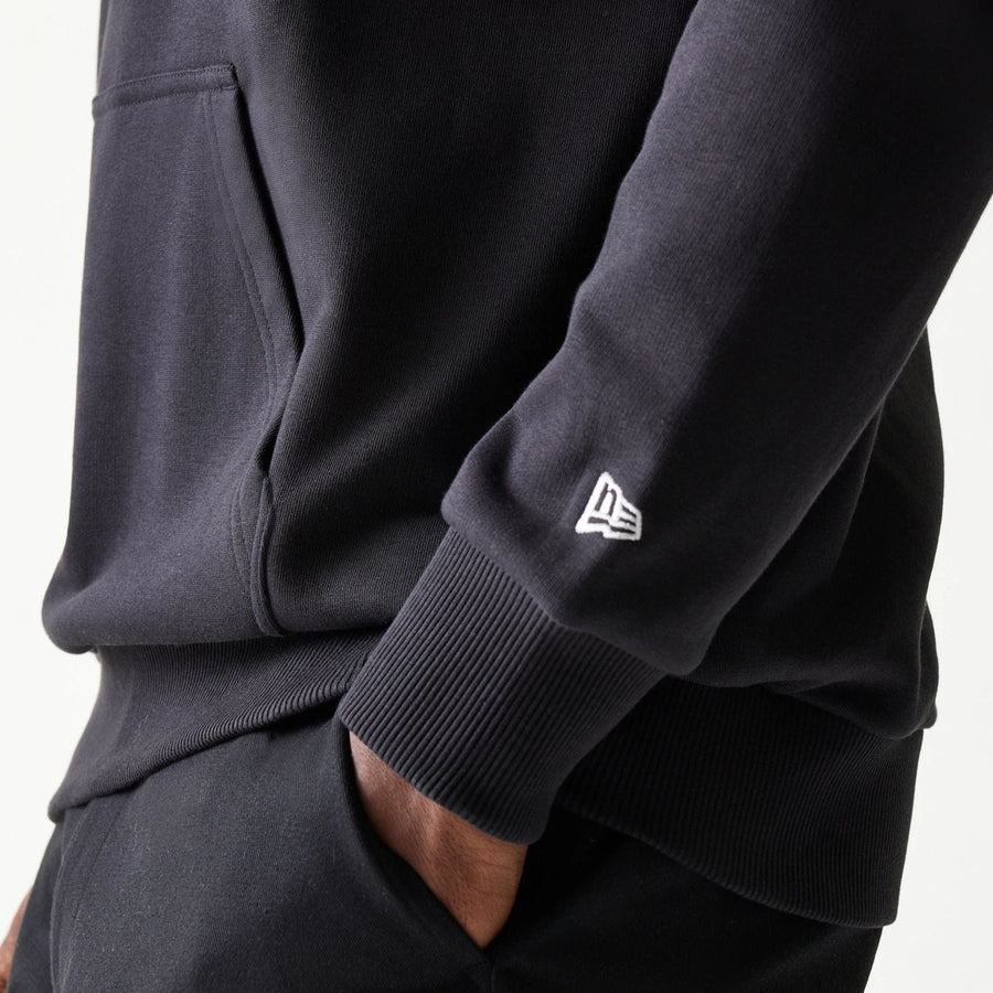 The Male model is wearing Red Bull Racing Black Oversized Pullover Hoodie 4