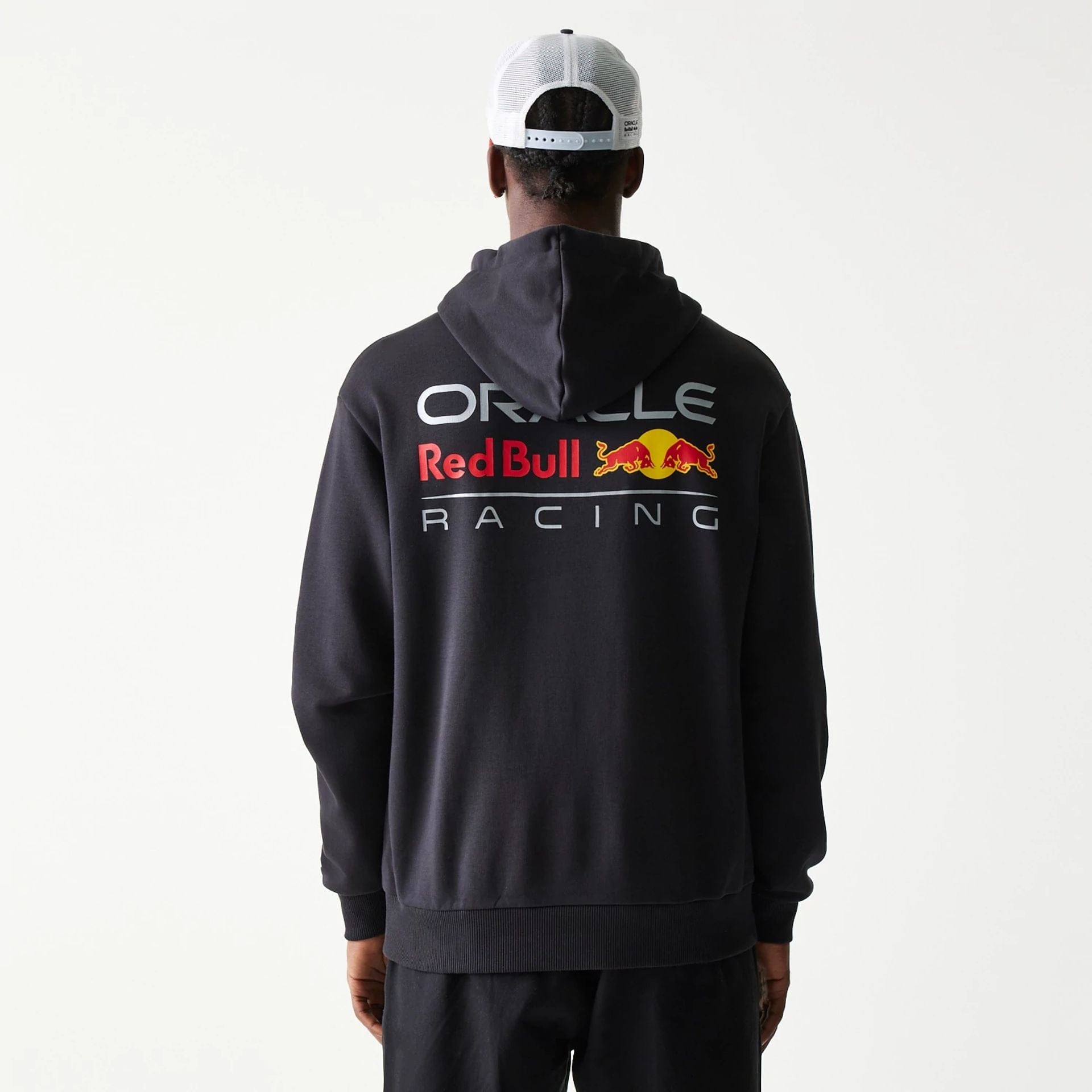 The Male model is wearing Red Bull Racing Black Oversized Pullover Hoodie 2