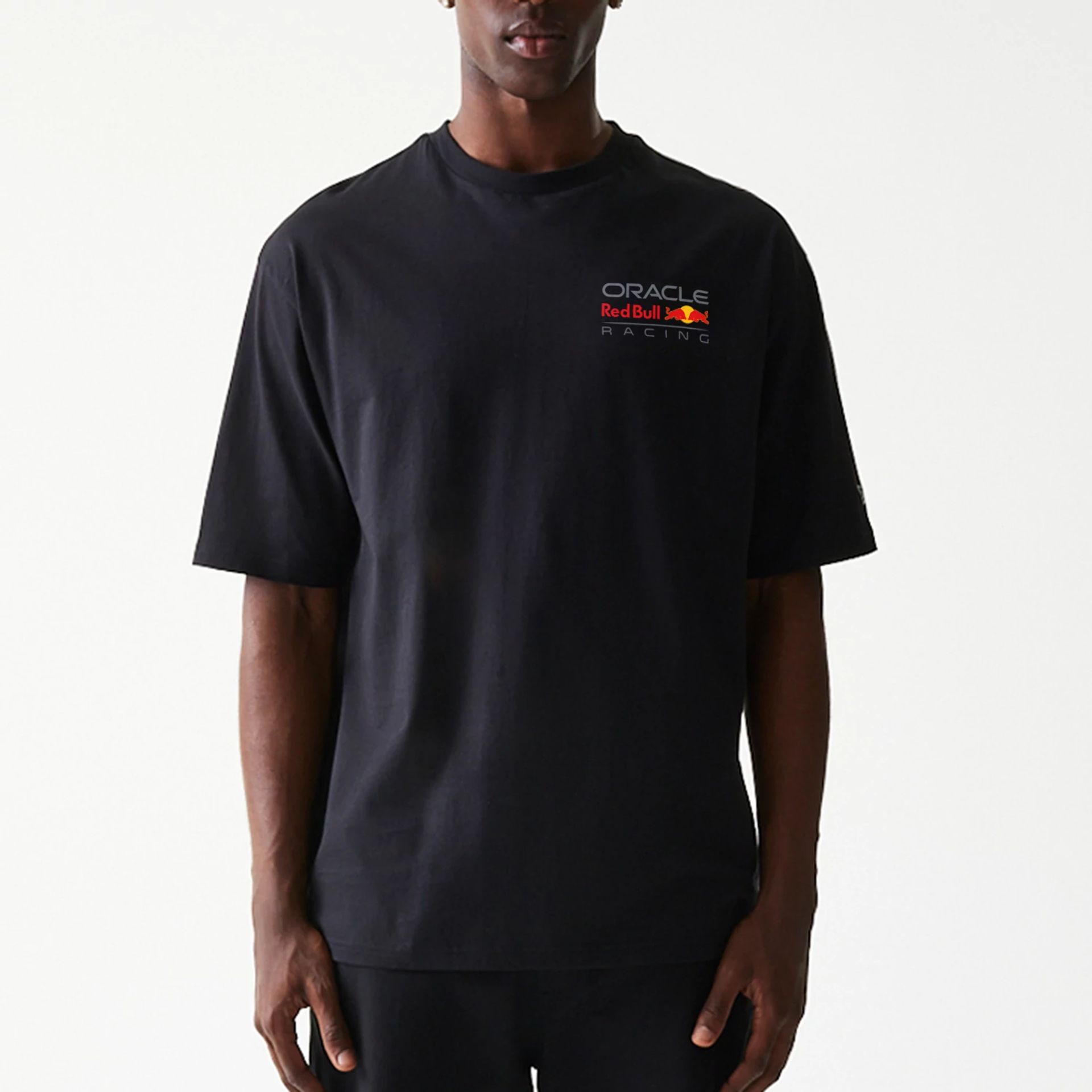 The Male model is wearing Red Bull Racing Black Oversized T-Shirt 5