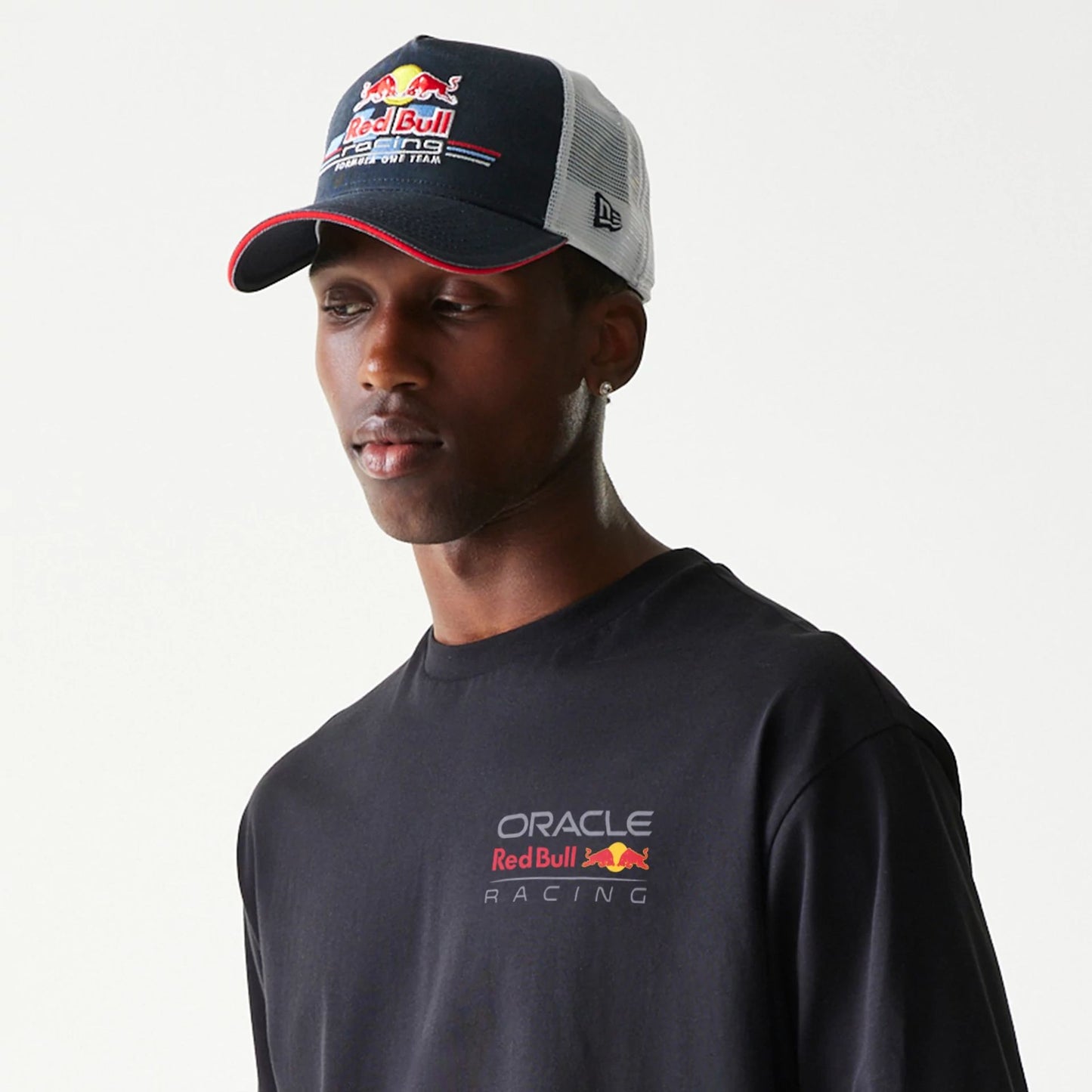 The Male model is wearing Red Bull Racing Black Oversized T-Shirt 7