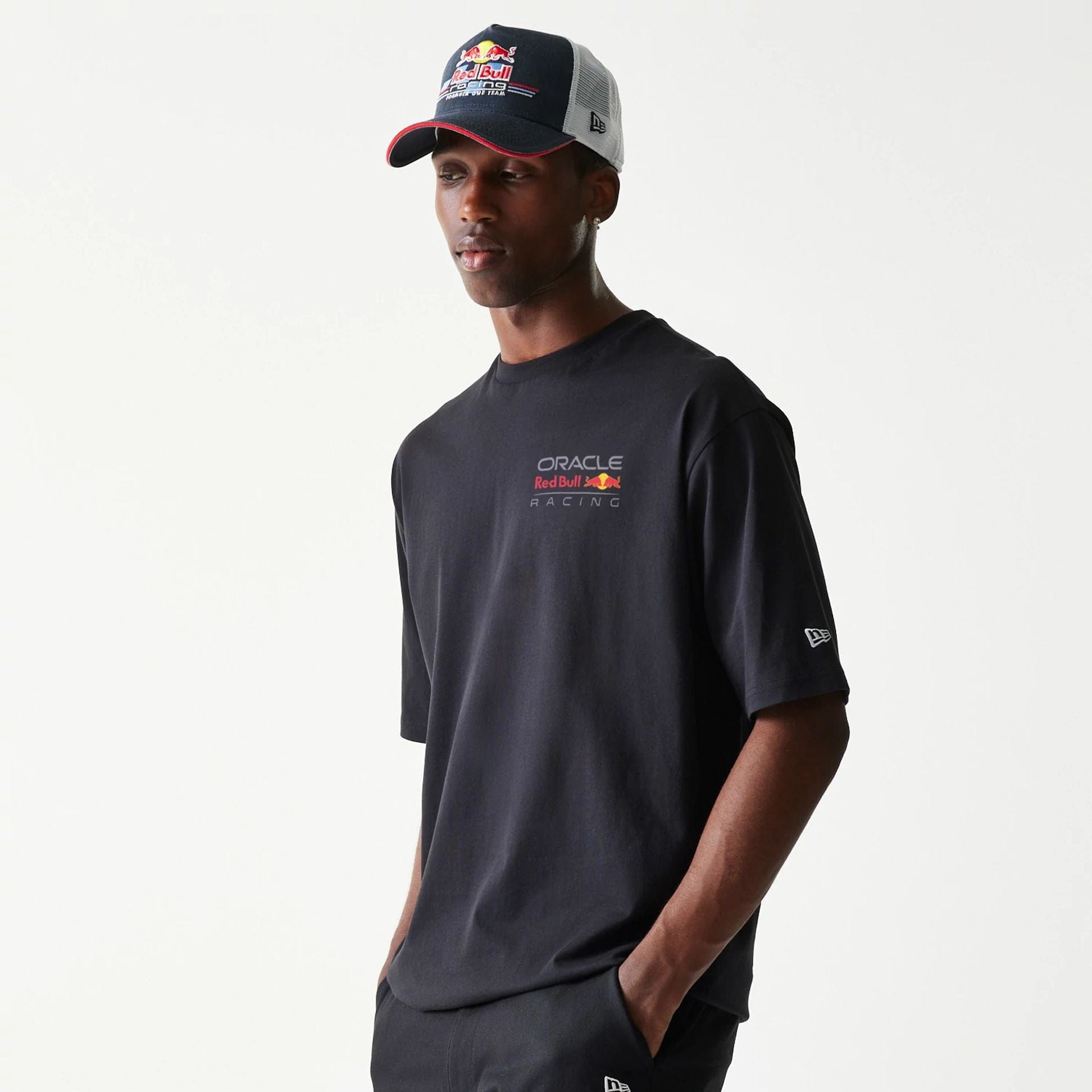 The Male model is wearing Red Bull Racing Black Oversized T-Shirt 1