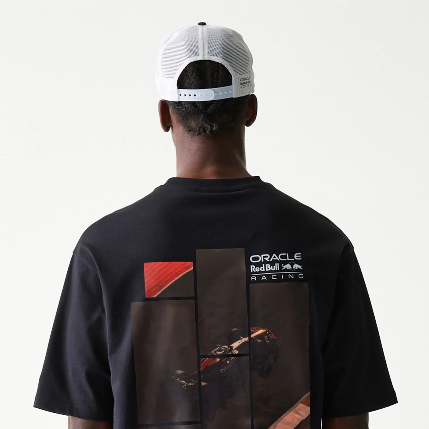 The Male model is wearing Red Bull Racing Black Oversized T-Shirt 4