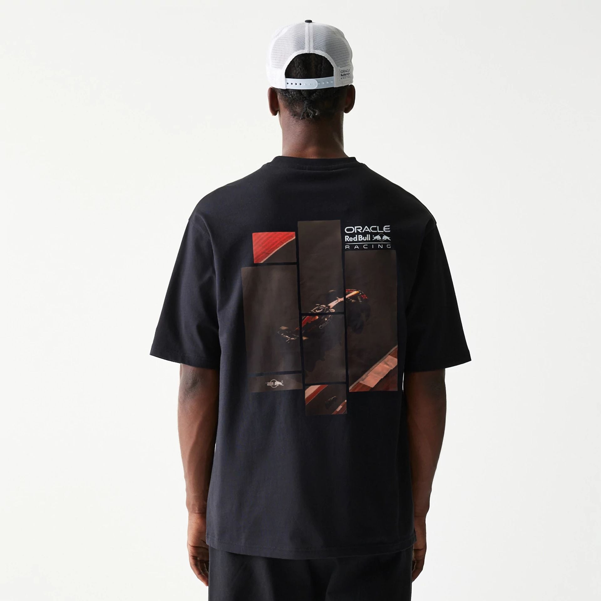The Male model is wearing Red Bull Racing Black Oversized T-Shirt 2
