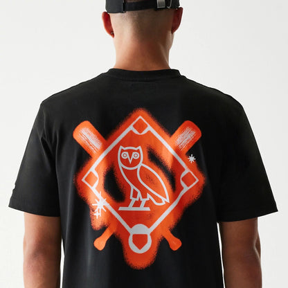 The Male model is wearing San Francisco Giants OVO x MLB Black T-Shirt 7
