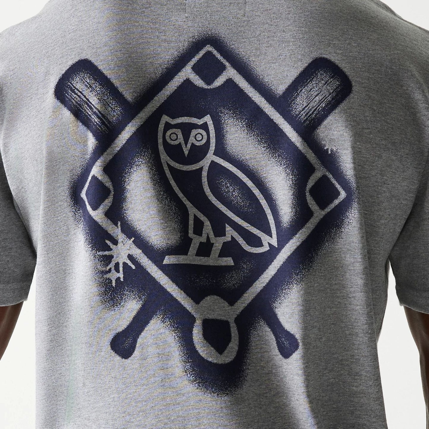 The Male model is wearing New York Yankees OVO x MLB Grey T-Shirt 6