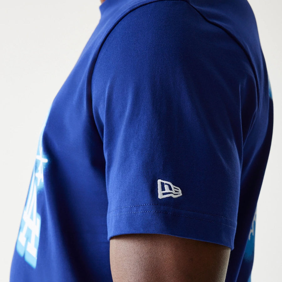 The Male model is wearing LA Dodgers OVO x MLB Dark Blue T-Shirt 4