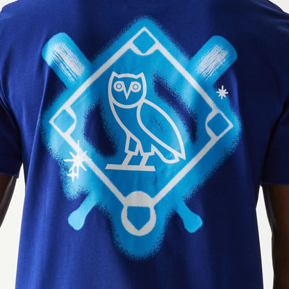 The Male model is wearing LA Dodgers OVO x MLB Dark Blue T-Shirt 5