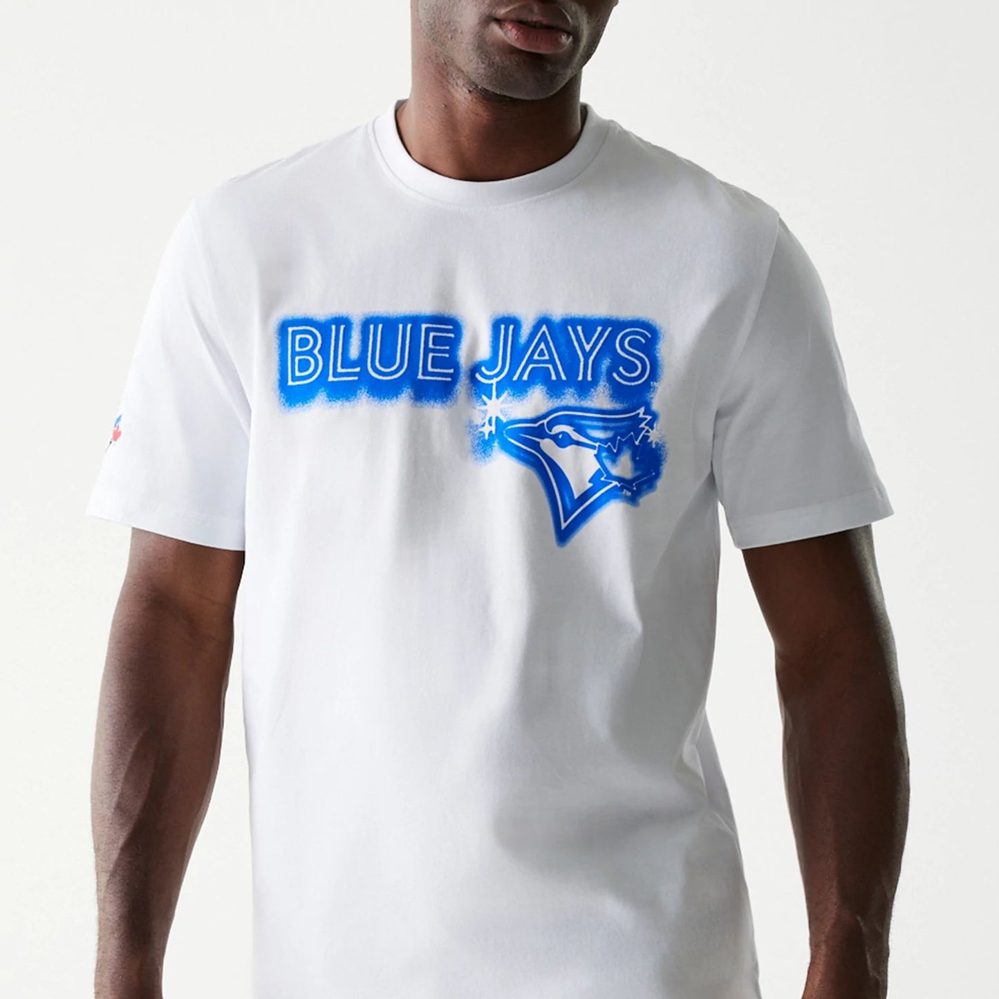 The Male model is wearing Toronto Blue Jays OVO x MLB White T-Shirt 3