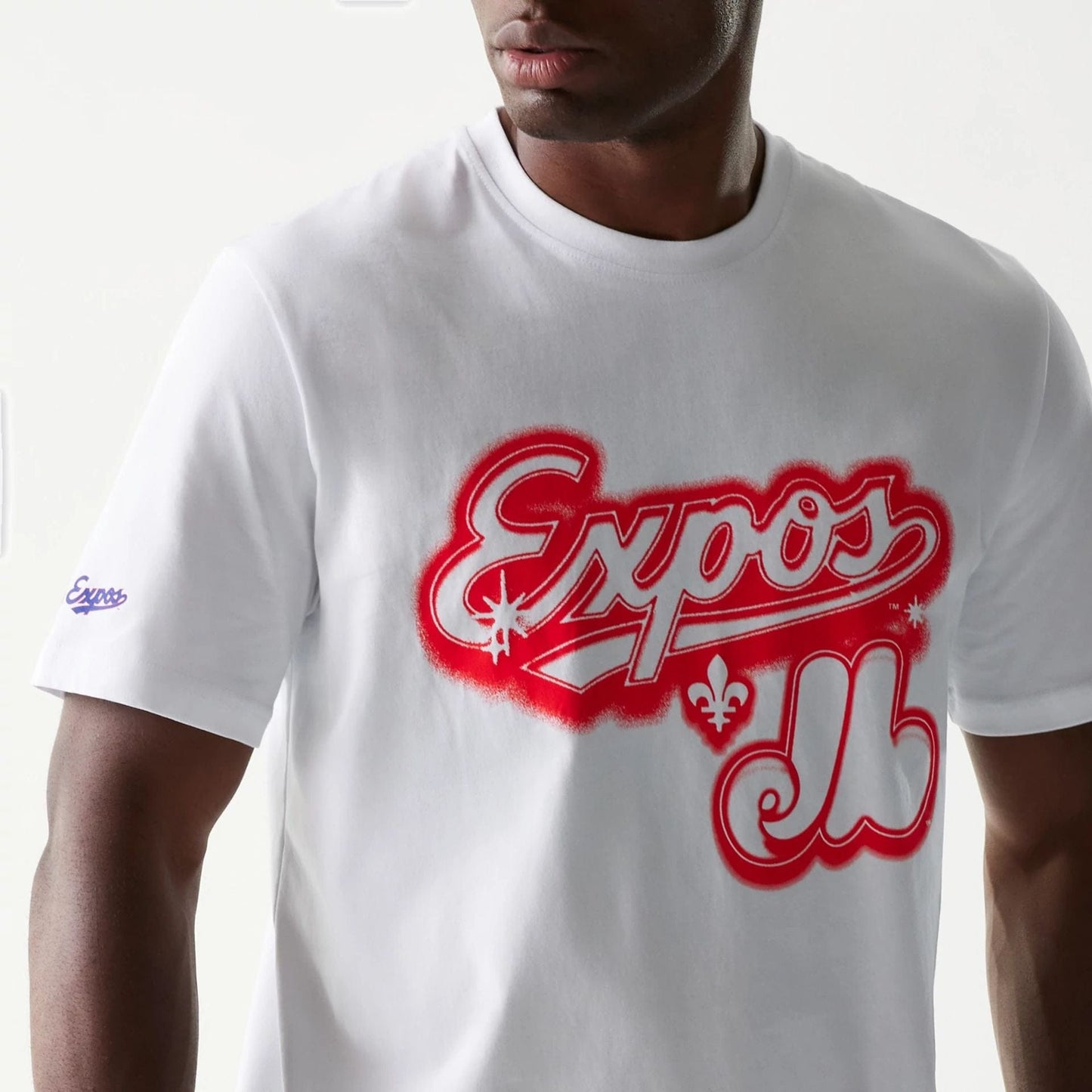 The Male model is wearing Montreal Expos OVO x MLB White T-Shirt 3