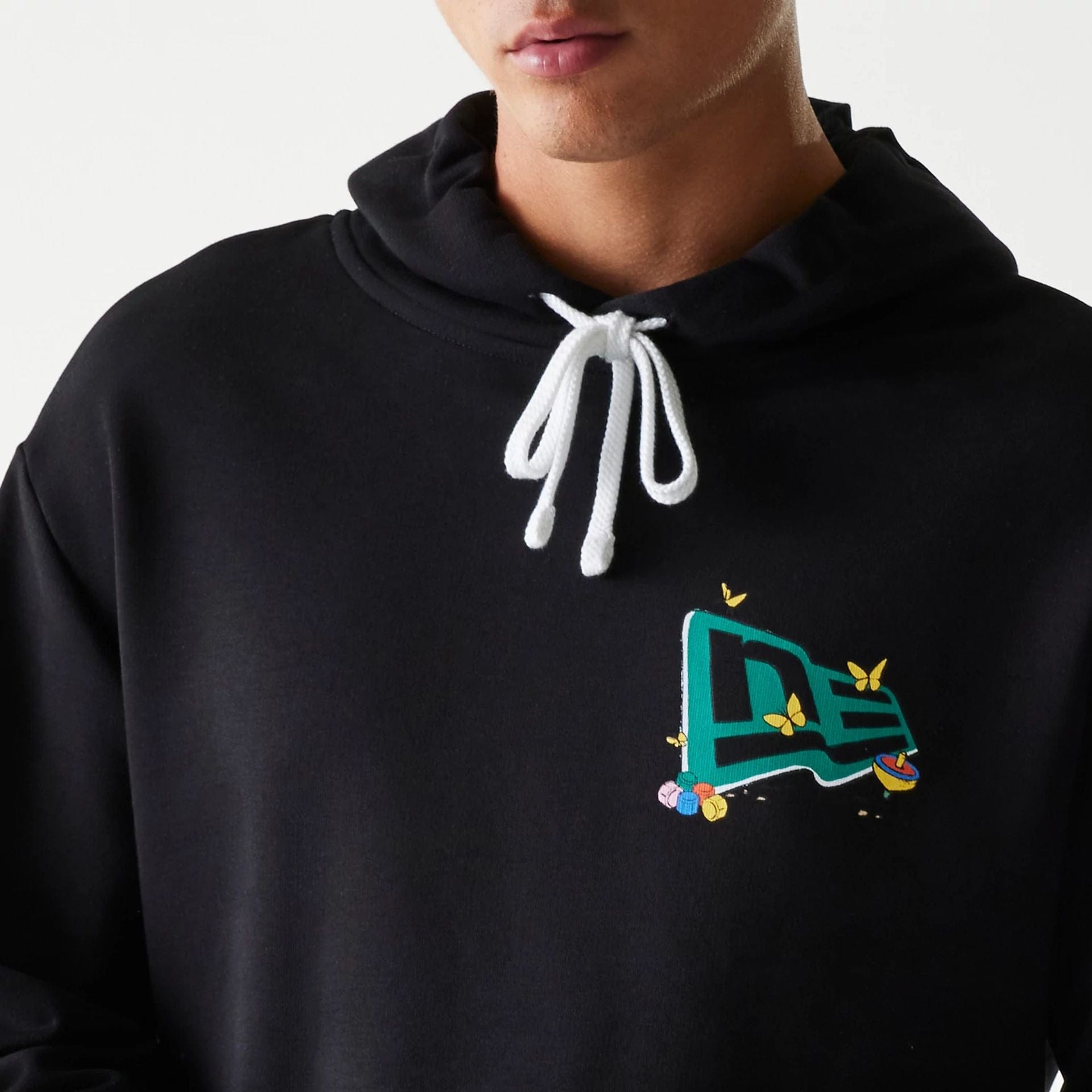 The Male model is wearing Netflix Squid Game Black Oversized Pullover Hoodie 3