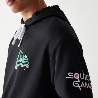 The Male model is wearing Netflix Squid Game Black Oversized Pullover Hoodie 6