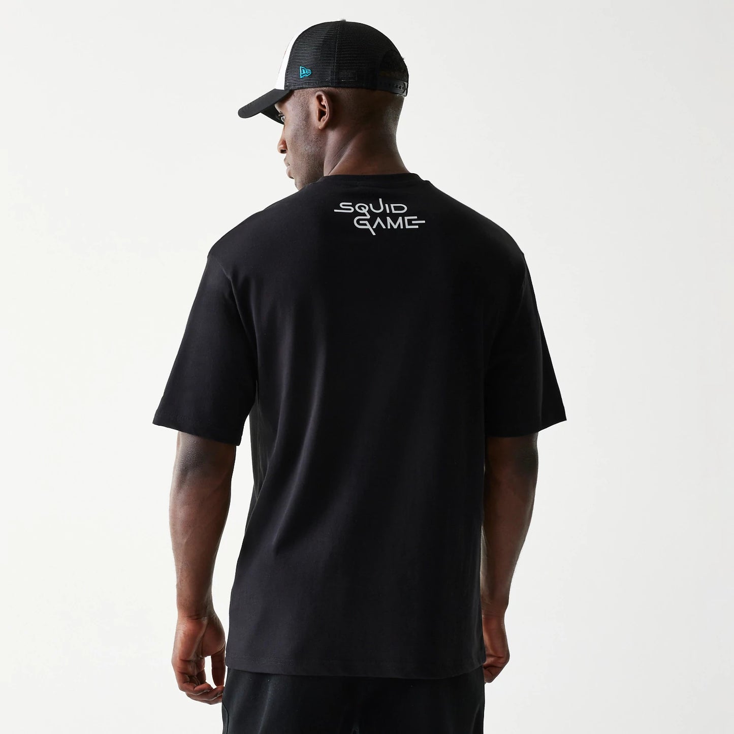 The Male model is wearing Netflix Squid Game Black Oversized T-Shirt 2