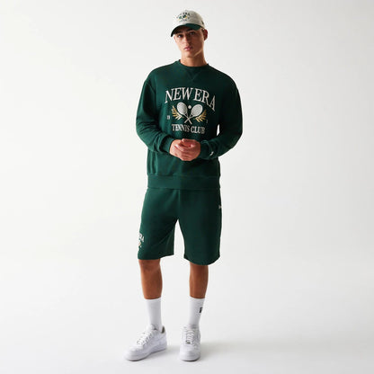 The Male model is wearing New Era Dark Green Oversized Crew Neck Sweater 8