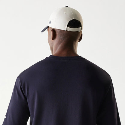 The Male model is wearing New Era Navy Oversized T-Shirt 7
