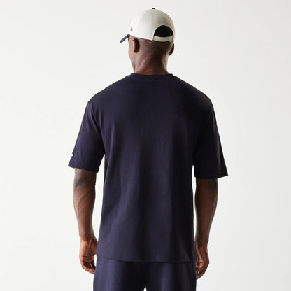 The Male model is wearing New Era Navy Oversized T-Shirt 2