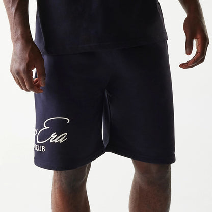 The Male model is wearing New Era Side Logo Navy Shorts 3