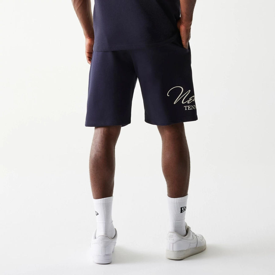 The Male model is wearing New Era Side Logo Navy Shorts 2