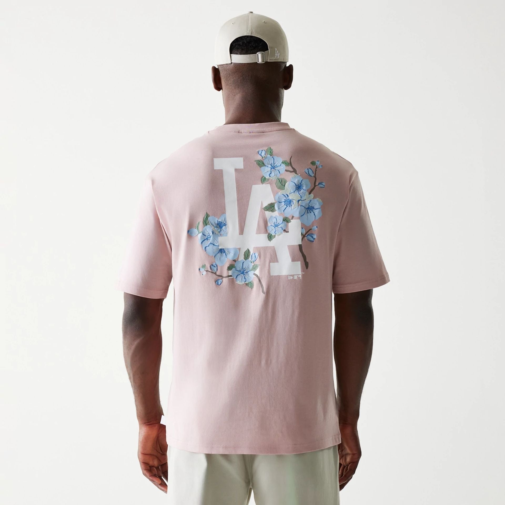 The Male model is wearing LA Dodgers MLB Floral Pastel Pink Oversized T-Shirt 2