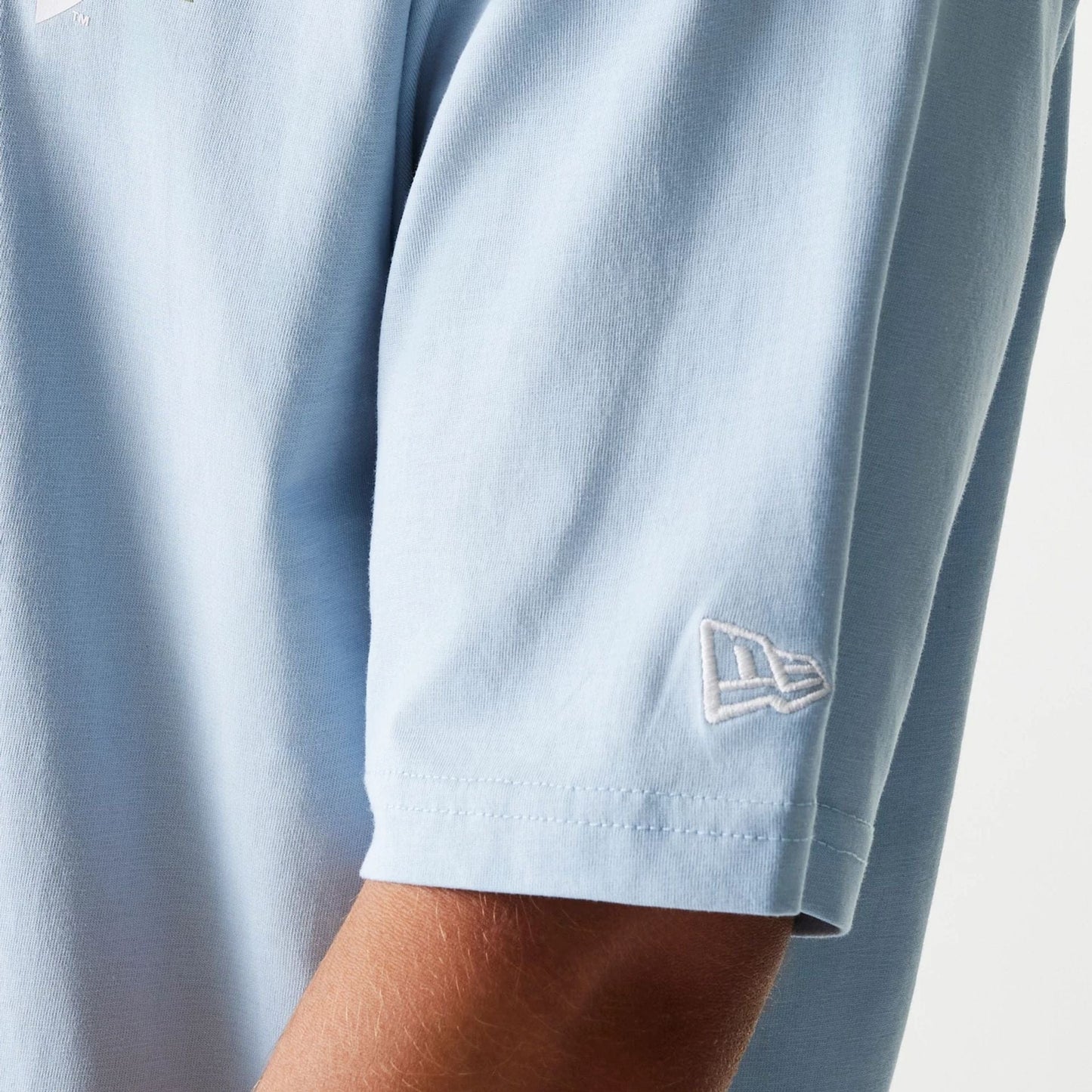 The Male model is wearing New York Yankees MLB Floral Pastel Blue Oversized T-Shirt 5