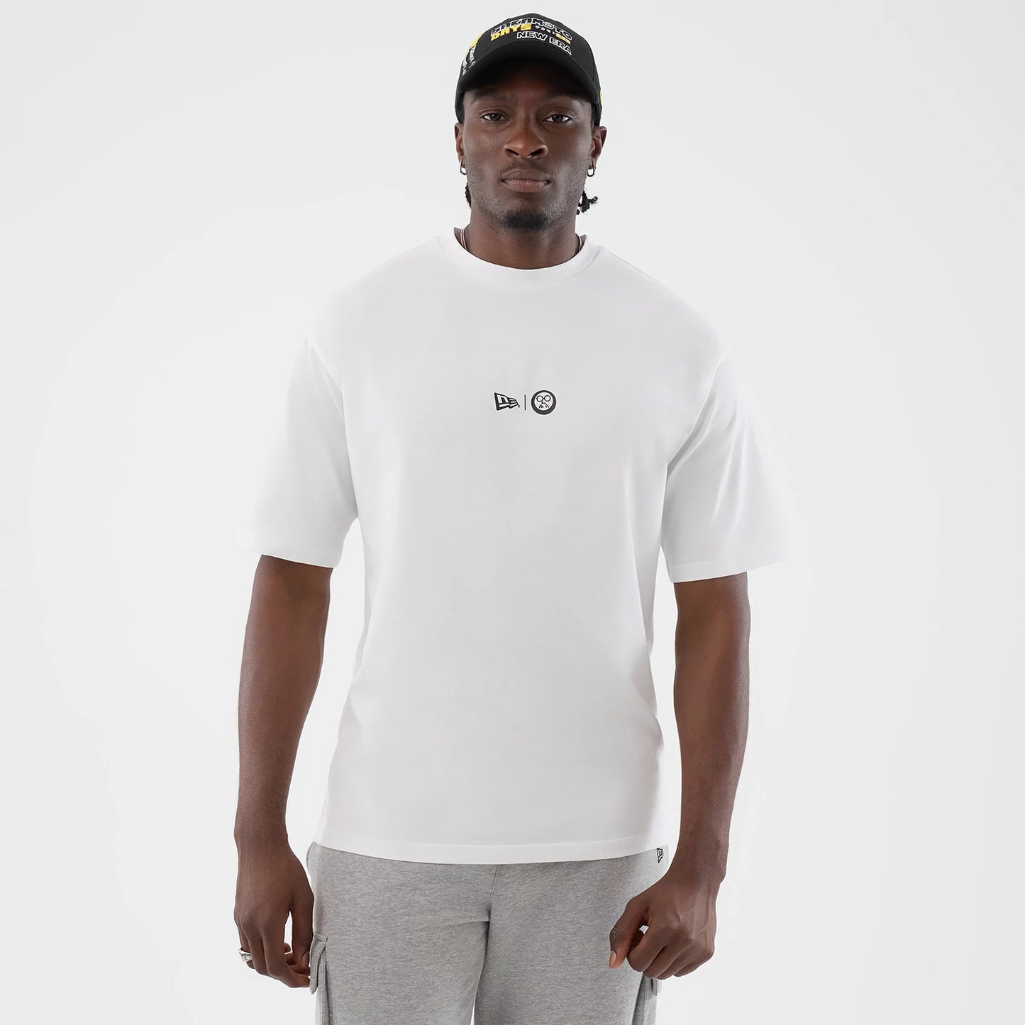 The Male model is wearing Sakamoto Days Icon Netflix White T-Shirt 1