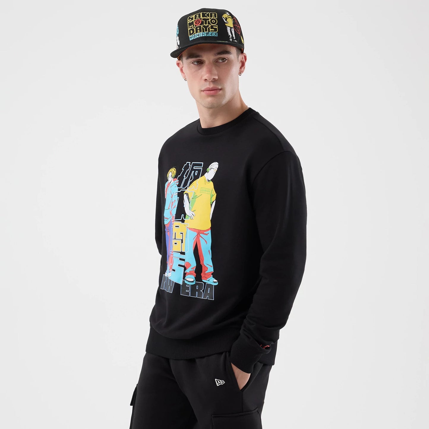 The Male model is wearing Sakamoto Days Netflix Black Crew Neck Sweater 4