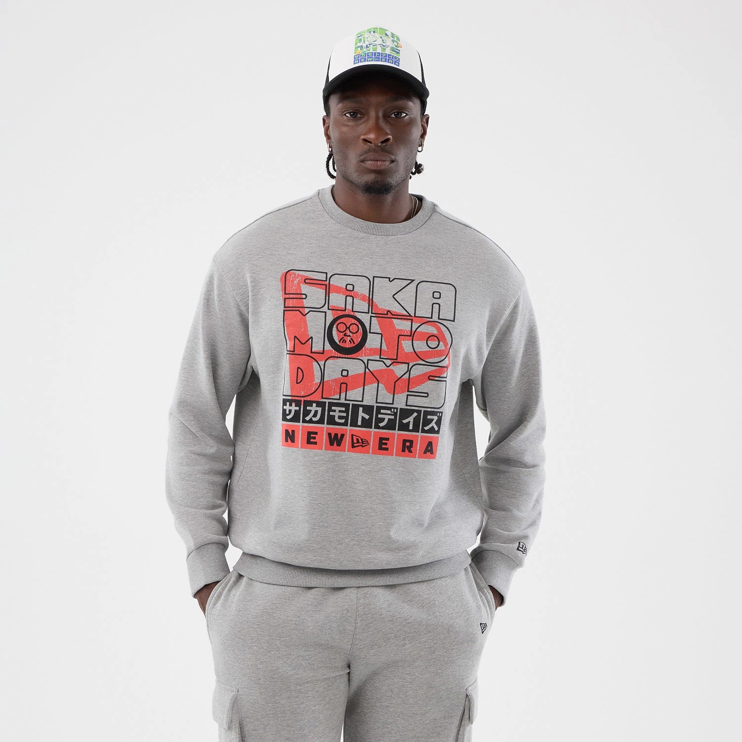 The Male model is wearing Sakamoto Days Netflix Grey Crew Neck Sweater 6