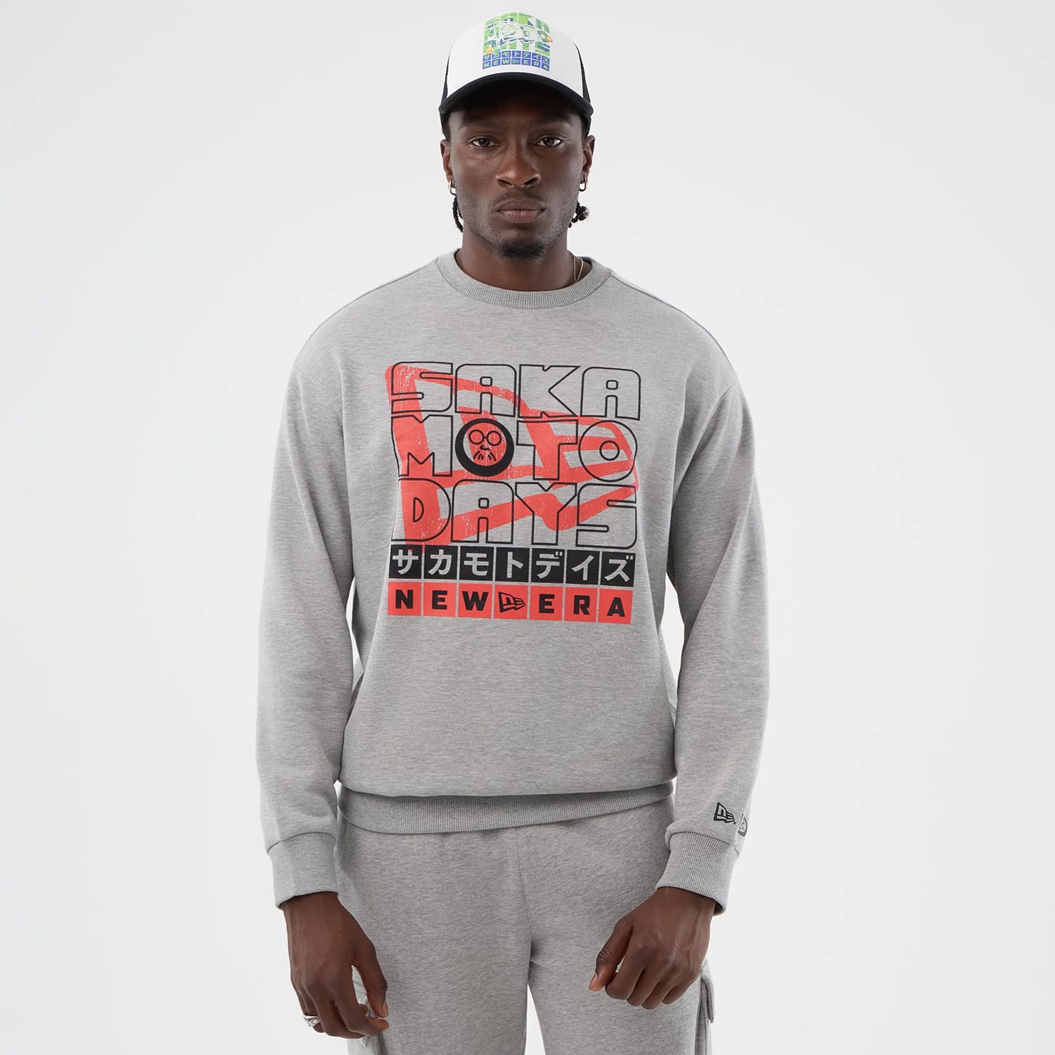 The Male model is wearing Sakamoto Days Netflix Grey Crew Neck Sweater 1