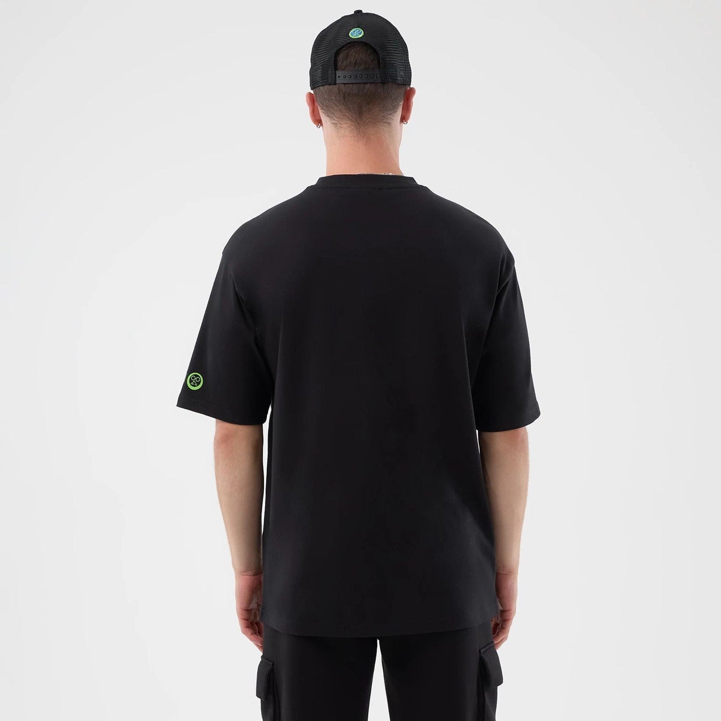 The Male model is wearing Sakamoto Days Netflix Black T-Shirt  2