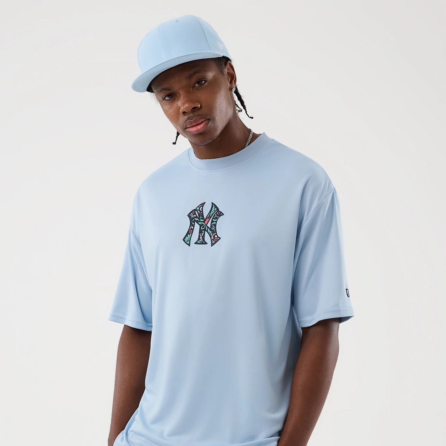 The Male model is wearing New York Yankees MLB Mesh Infill Pastel Blue Oversized T-Shirt 6