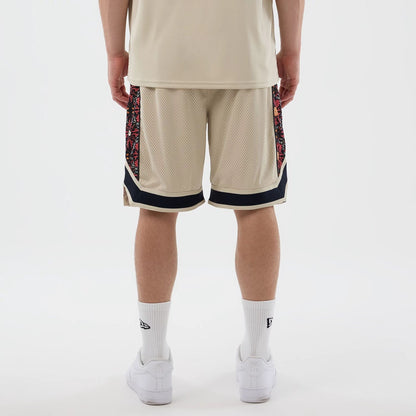 The Male model is wearing New Era Mesh Light Beige Mesh Shorts 2