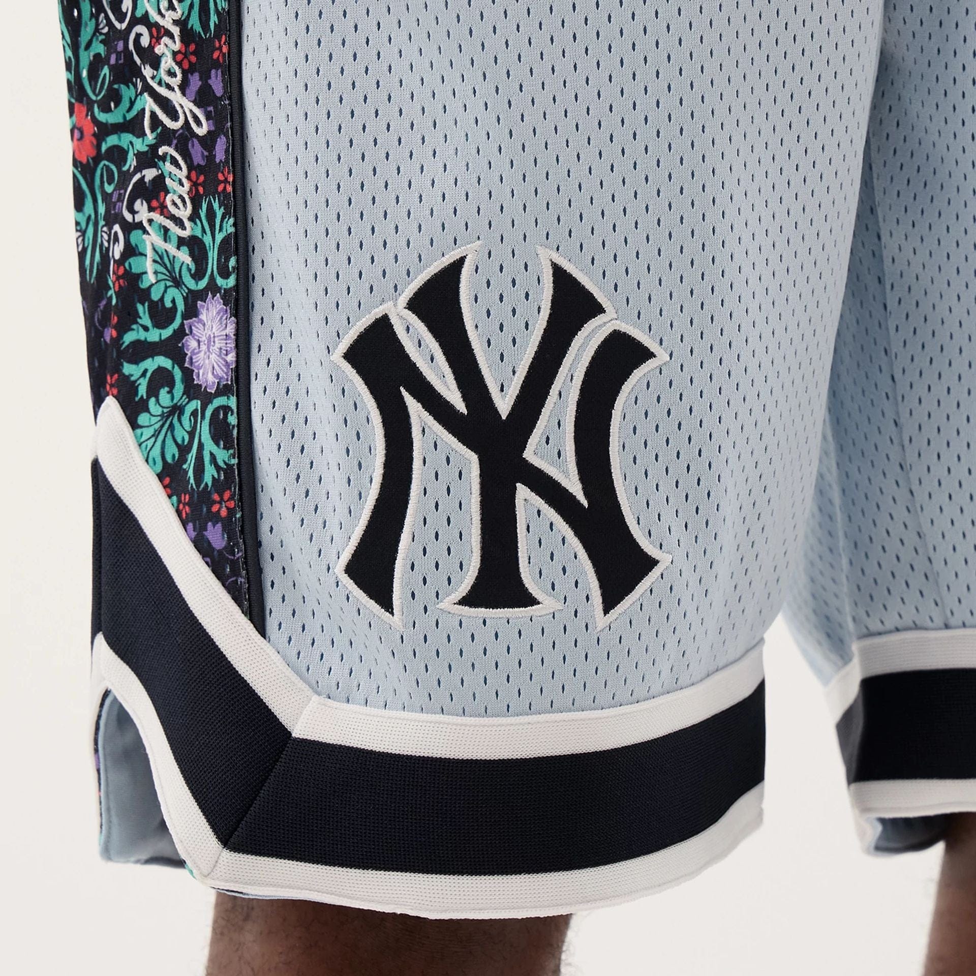 The Male model is wearing New York Yankees MLB Mesh Pastel Blue Mesh Shorts 7