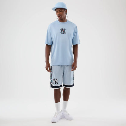 The Male model is wearing New York Yankees MLB Mesh Pastel Blue Mesh Shorts 3