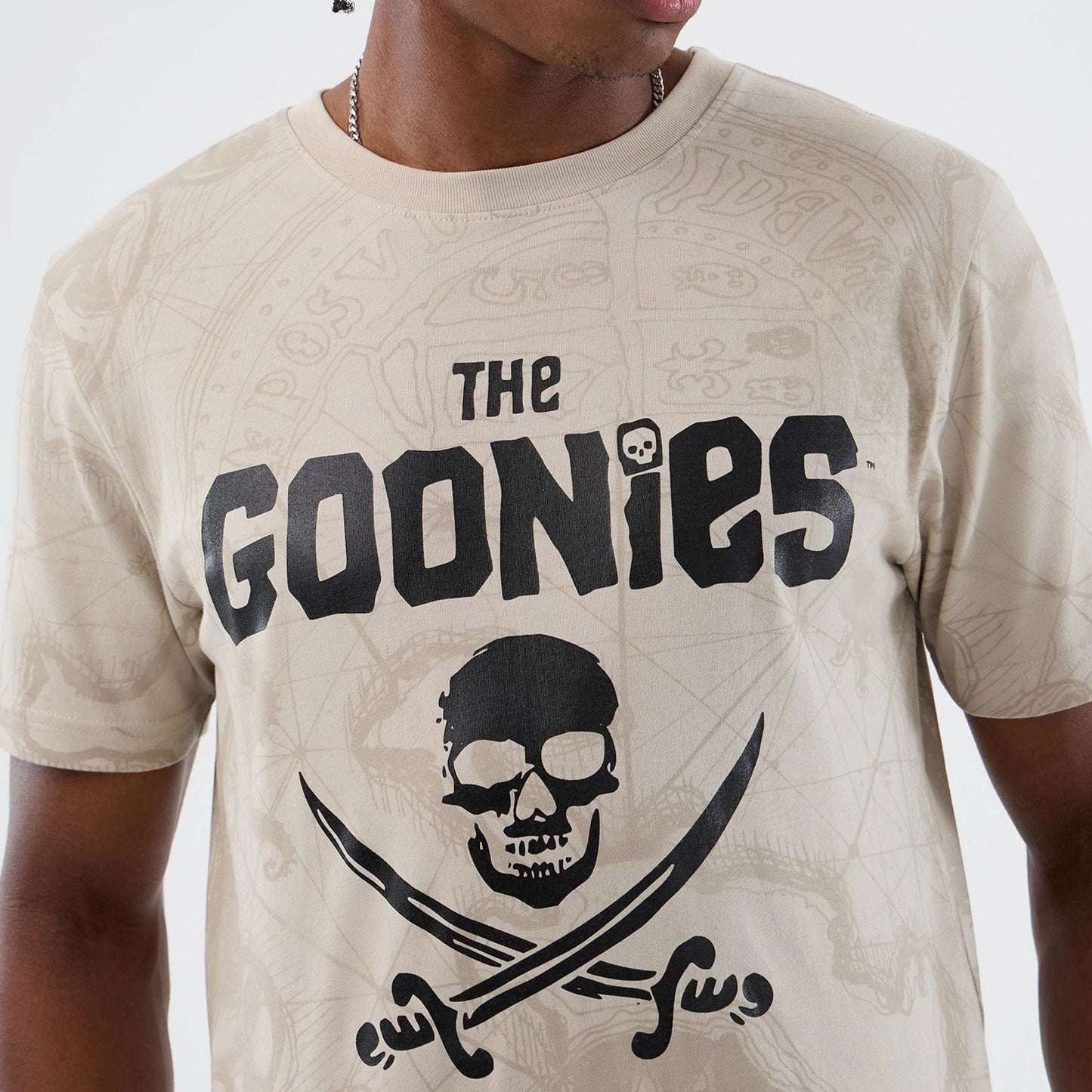 The model is wearing this Treasure Map The Goonies T-Shirt in light beige. 3
